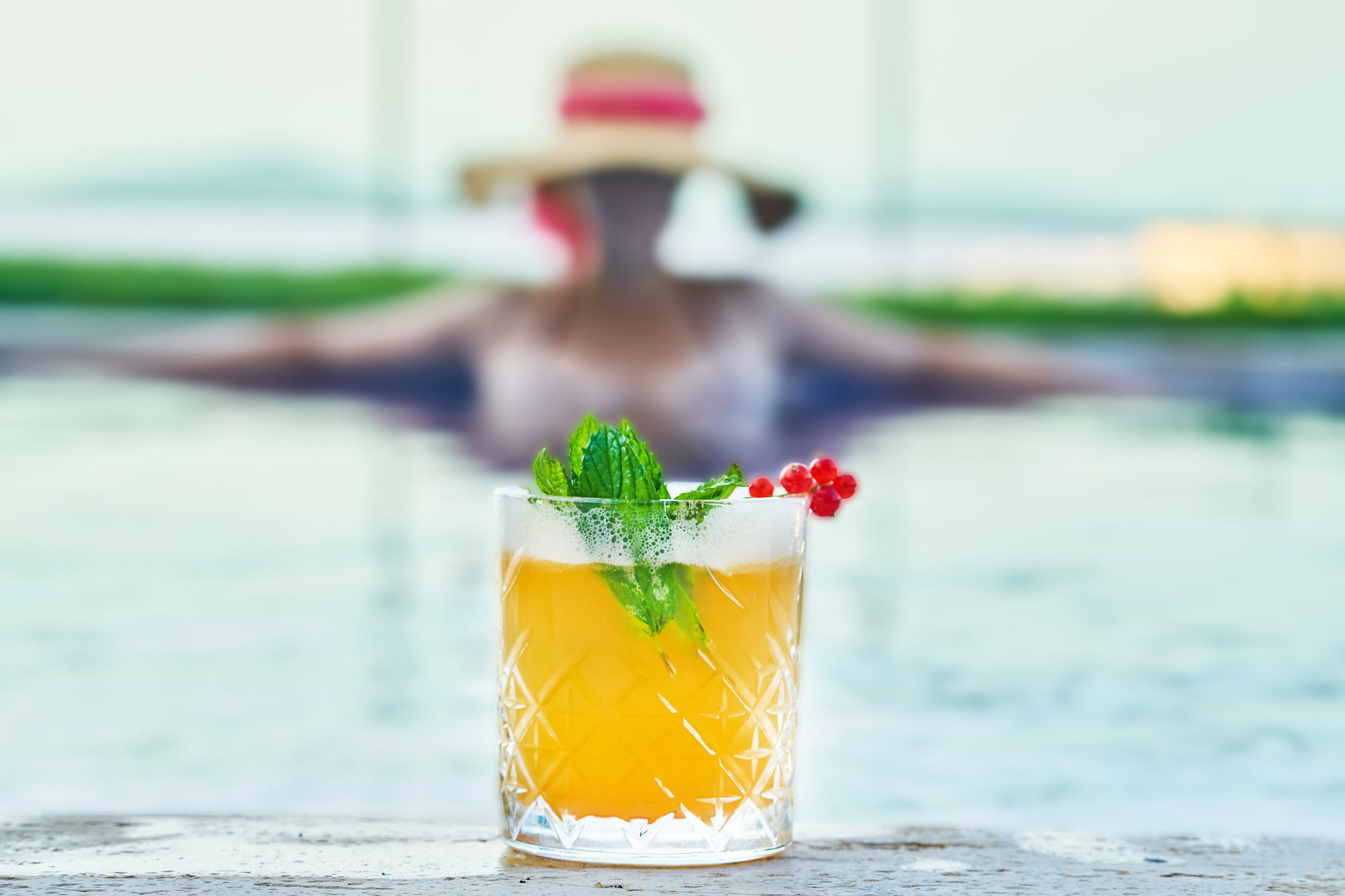 Cruise Drink Packages: Woman with drink at pool